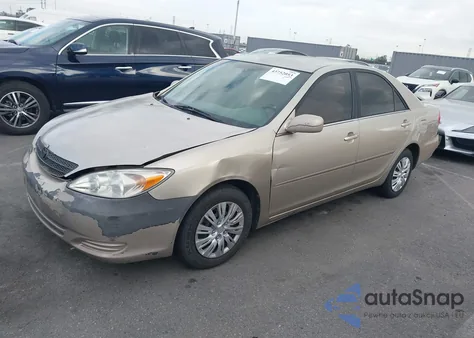 2004 Toyota Camry Le z USA, uszkodzony, nr VIN 4T1BE32K94U854215